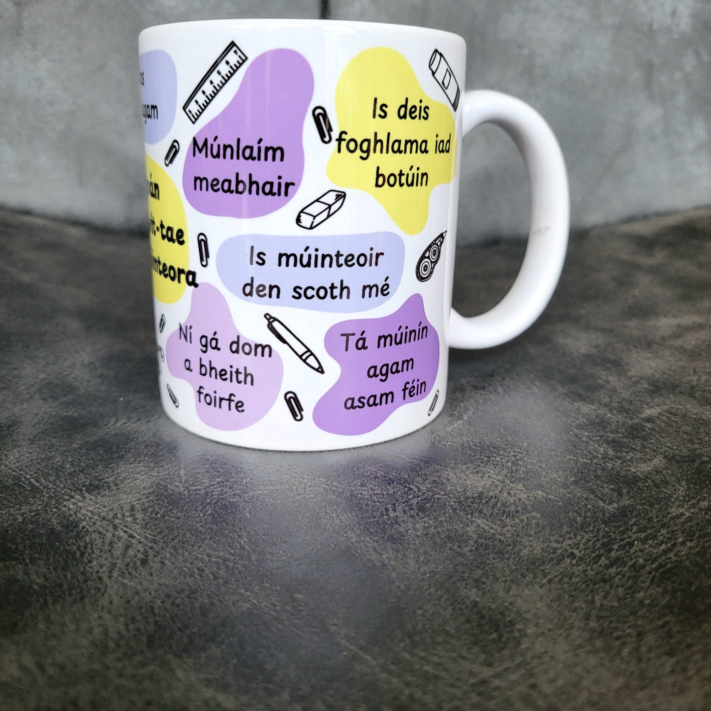 Cupán positivit-tae an mhúinteora