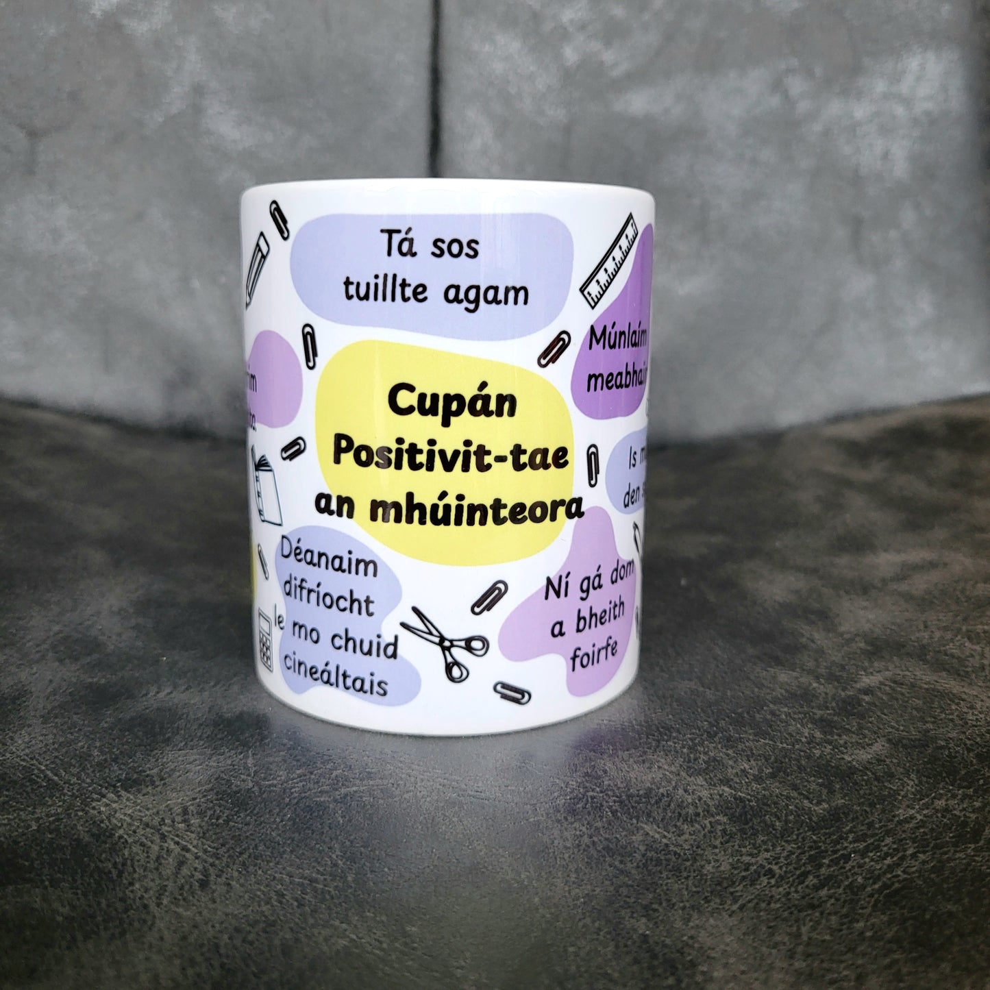 Cupán positivit-tae an mhúinteora