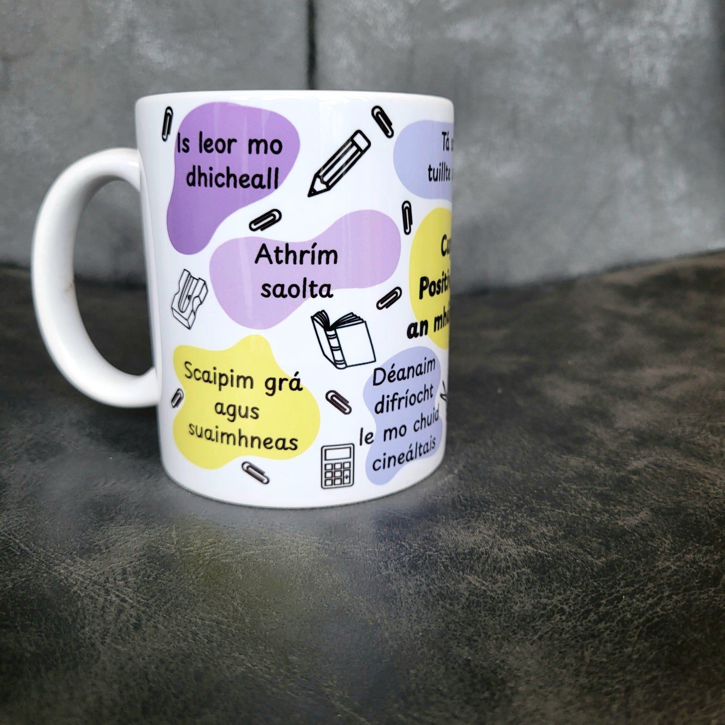 Cupán positivit-tae an mhúinteora